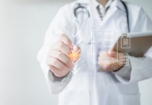 Medicine doctor use tablet to review patient medical records on virtual screens for digital healthcare.