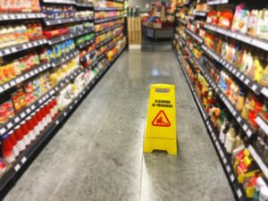 Warning Sign of Cleaning in Progress in a retail store.