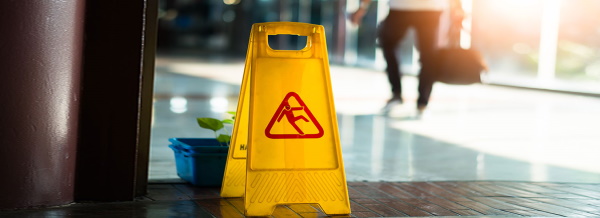wet floor sign hospital slips and falls concept