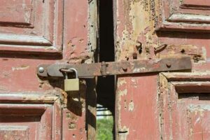 an old rusted lock, negligent security concept.