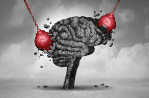 traumatic brain injury concept image, wrecking balls hit a brain