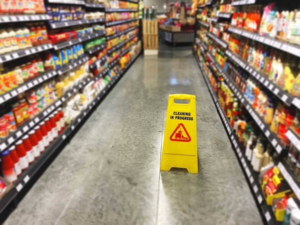 Warning Sign of Cleaning in Progress in a retail store.