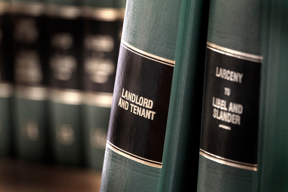 Macon Premises Liability Lawyer 3 Law books labeled landlord and tenant related to premises liability and property law.