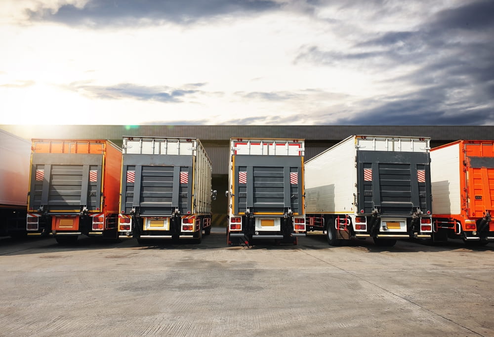 Commercial trucks parked at a distribution center in Georgia