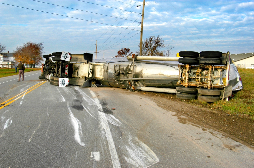 Overturned tanker truck after a severe highway truck accident.