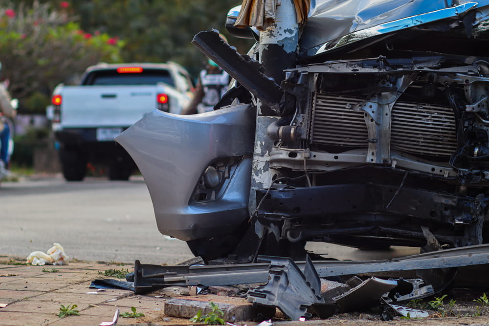 Severely damaged passenger vehicle after a truck accident in Columbus, Georgia